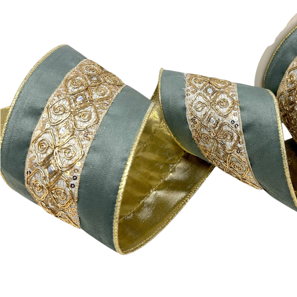 The Matthew John Collective soft aqua wired ribbon featuring an intricate embossed gold metallic trim and sequin detail.