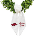 The Matthew John Collective white Arkansas wreath sash with red embroidered Razorback logo and Wooo Pig text