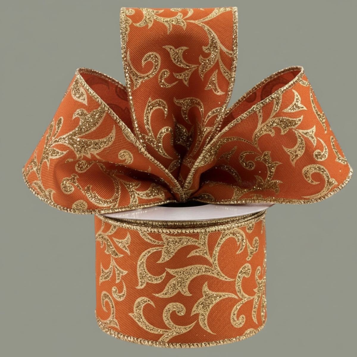 The Matthew John Collective autumn orange wired ribbon with gold glitter acanthus leaf pattern for seasonal decor