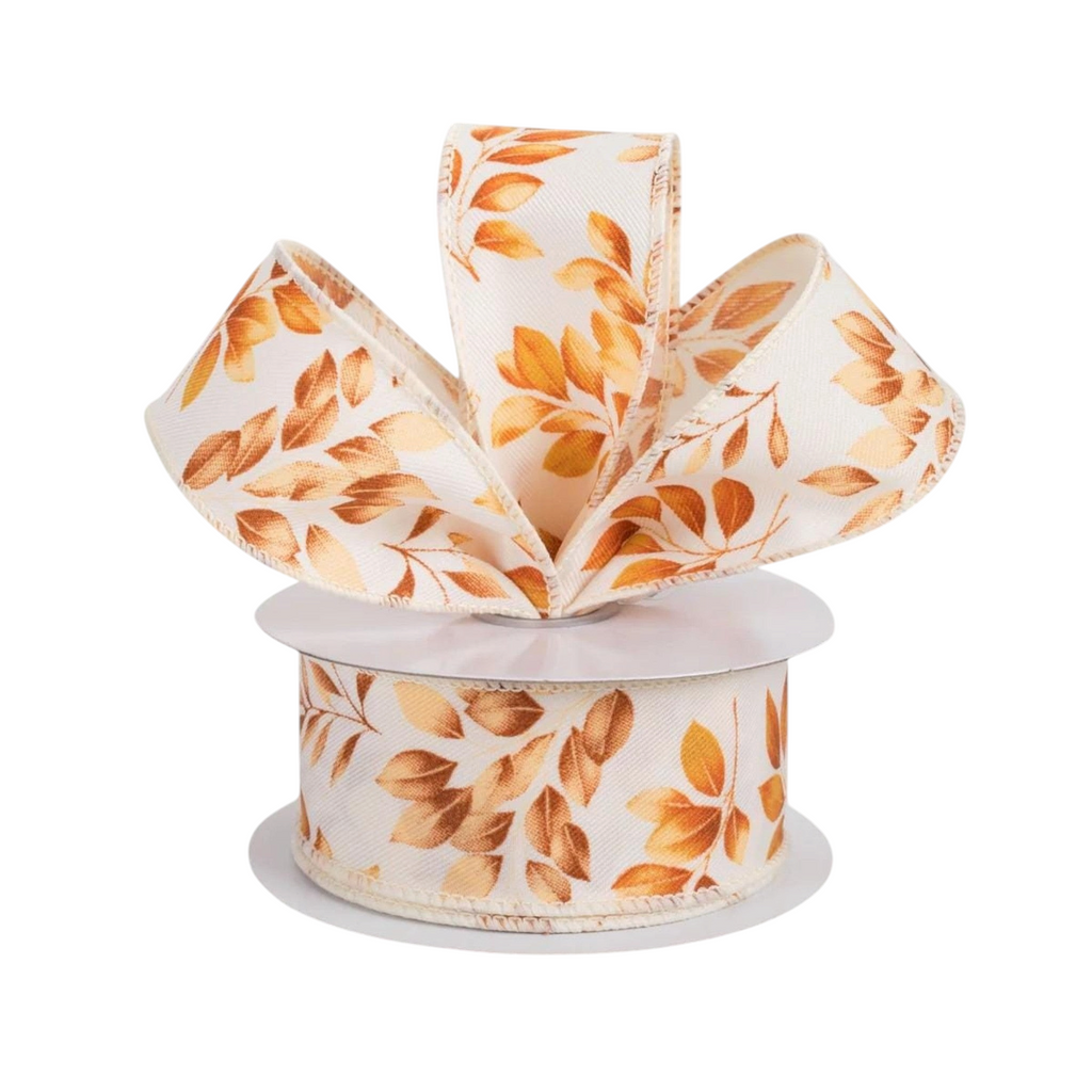 The Matthew John Collective ivory canvas ribbon with brown and orange autumn leaf print and wired edges.