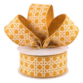The Matthew John Collective 1.5 inch dark yellow and ivory basket weave ribbon on a spool with a decorative bow.