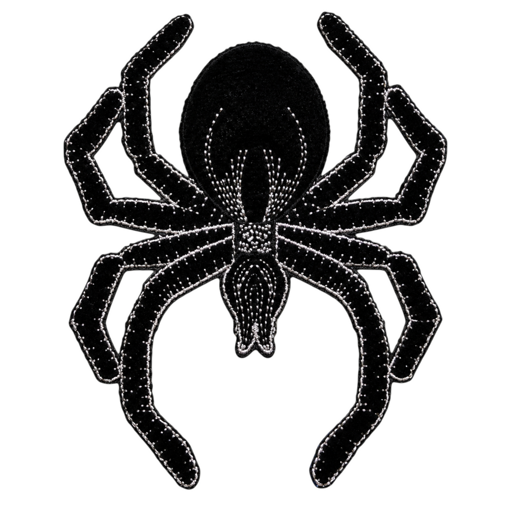 The Matthew John Collective 6-inch black felt spider with silver embroidered stitching for Halloween craft decor.