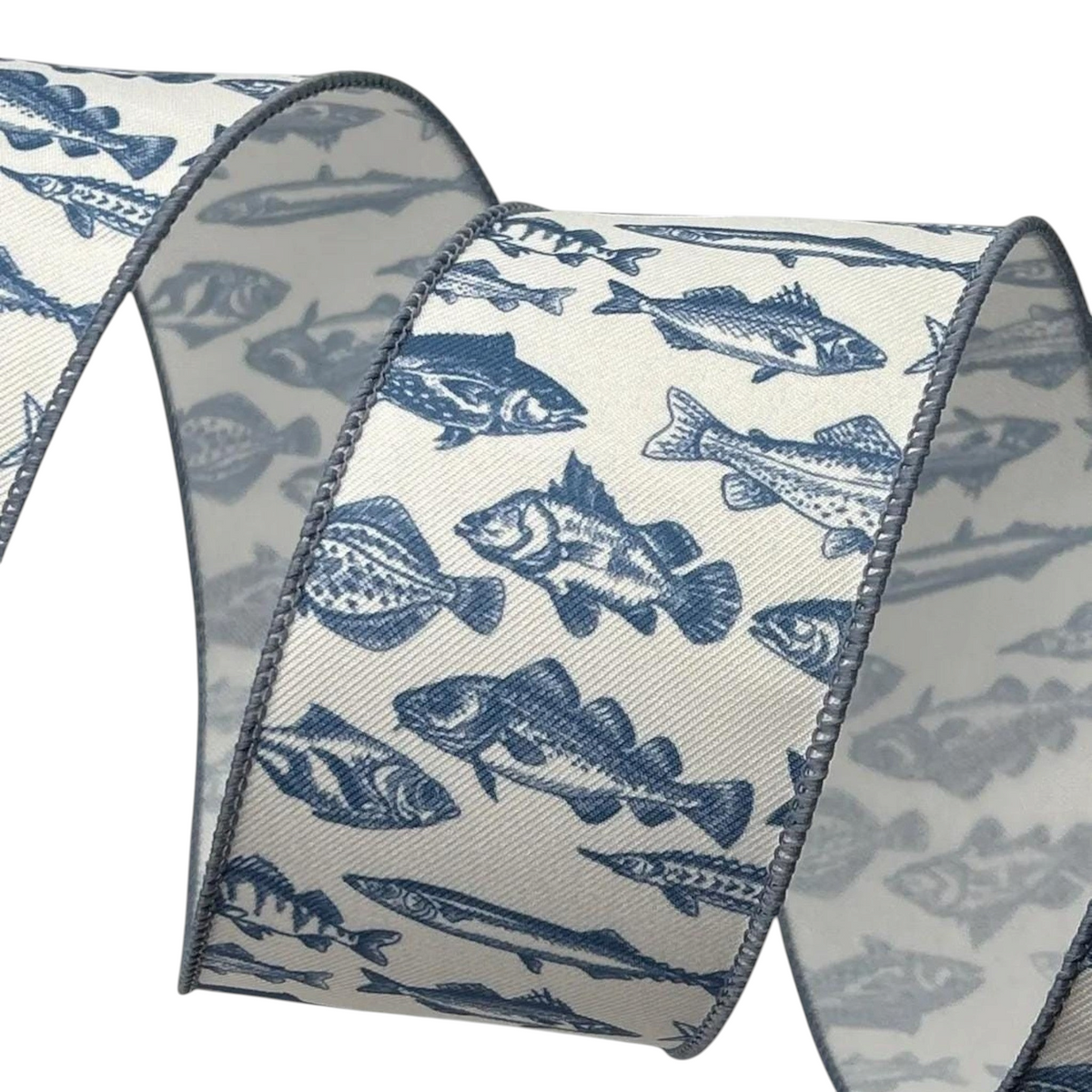 The Matthew John Collective blue fish patterned ribbon, 2.5 inch wide decorative fabric for wreaths and bows.