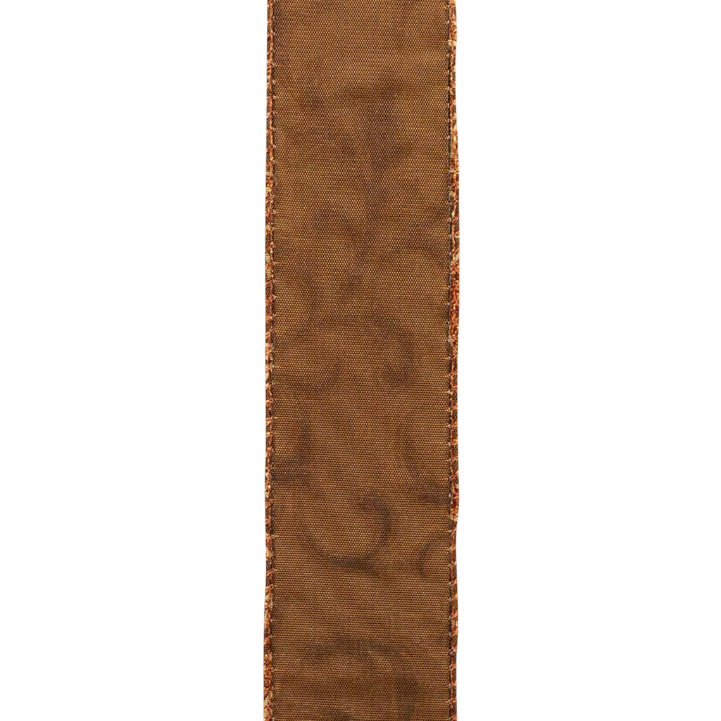 The Matthew John Collective copper wired ribbon with glittered scrollwork pattern for fall decor and gift wrapping.