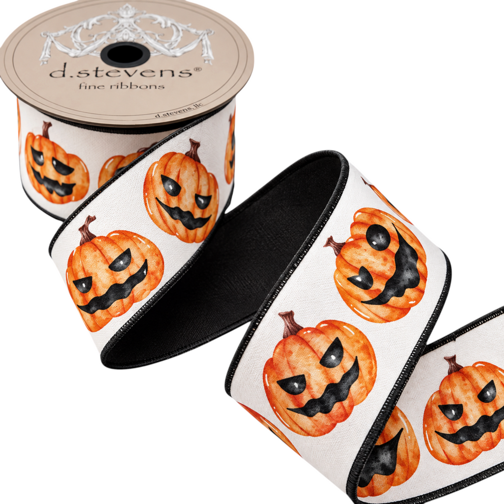 The Matthew John Collective D. Stevens 3-inch satin Halloween ribbon with watercolor jack-o-lanterns and wired edges.