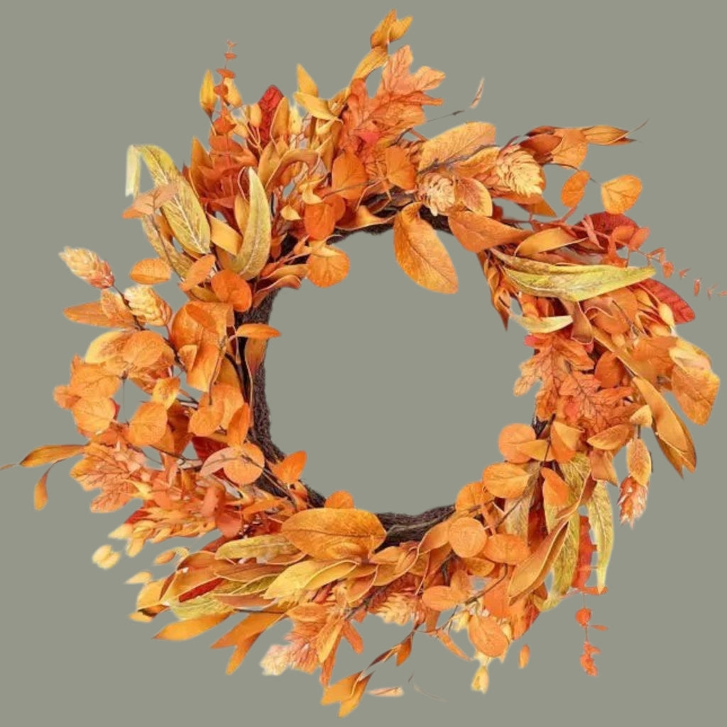 The Matthew John Collective 21-inch round fall garden wreath featuring layered autumn foliage in warm seasonal tones.