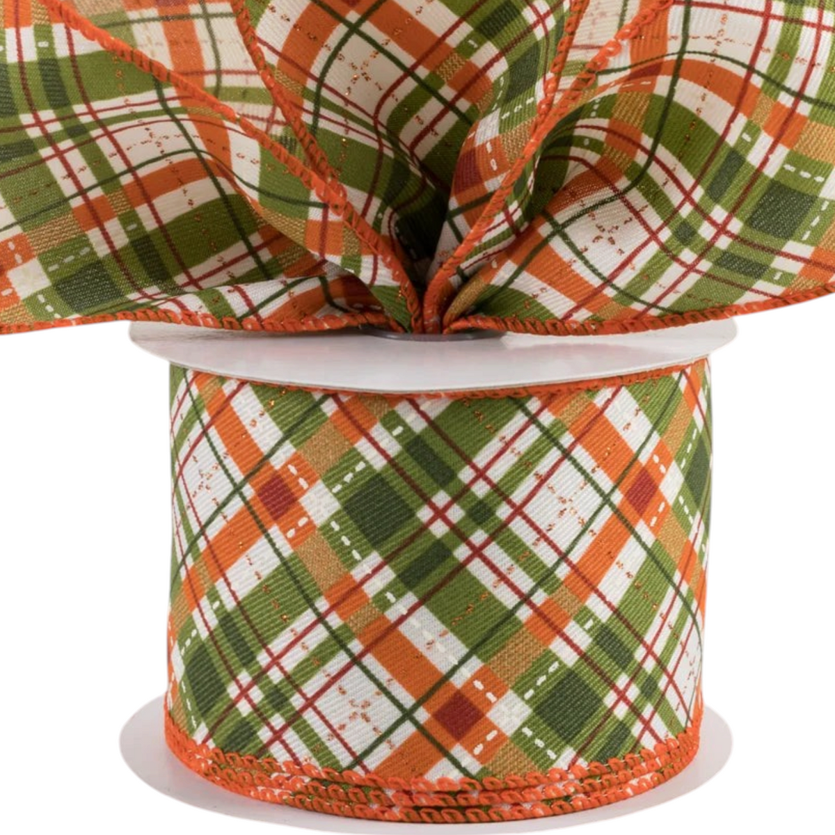 The Matthew John Collective fall plaid wired ribbon in olive green, rust orange, and metallic gold glitter on a spool