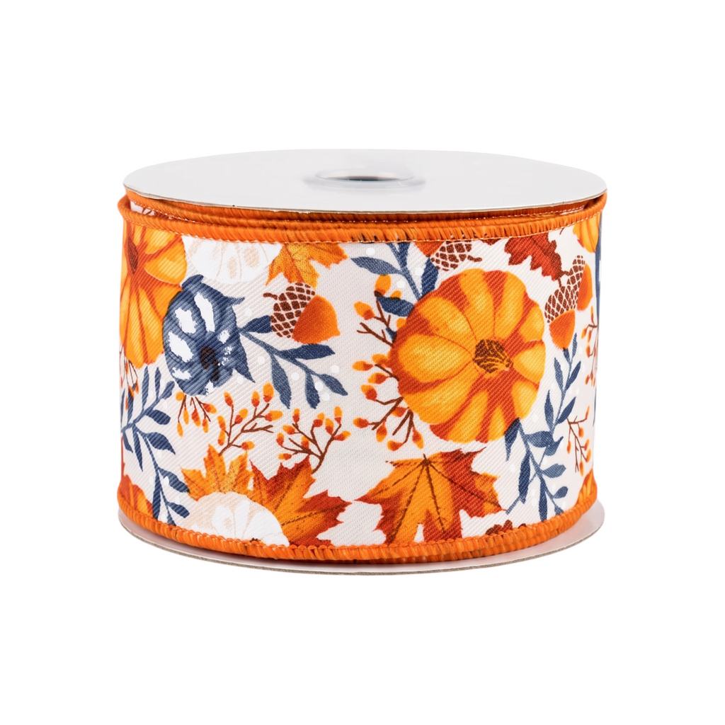 The Matthew John Collective 2.5 inch wired ribbon featuring orange pumpkins, fall foliage, and acorns on ivory fabric.