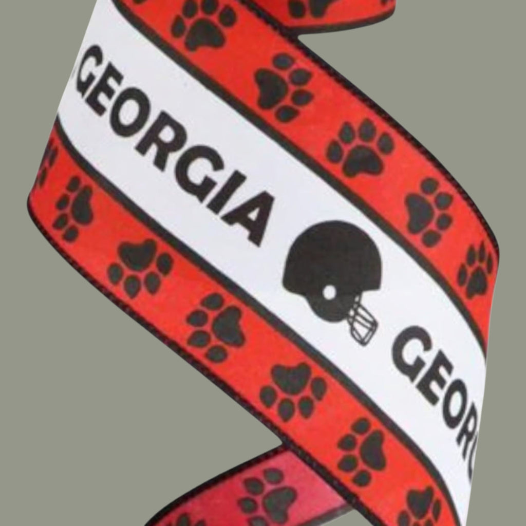 The Matthew John Collective Georgia stripe satin ribbon with black text, helmets, and paw prints on a white background.