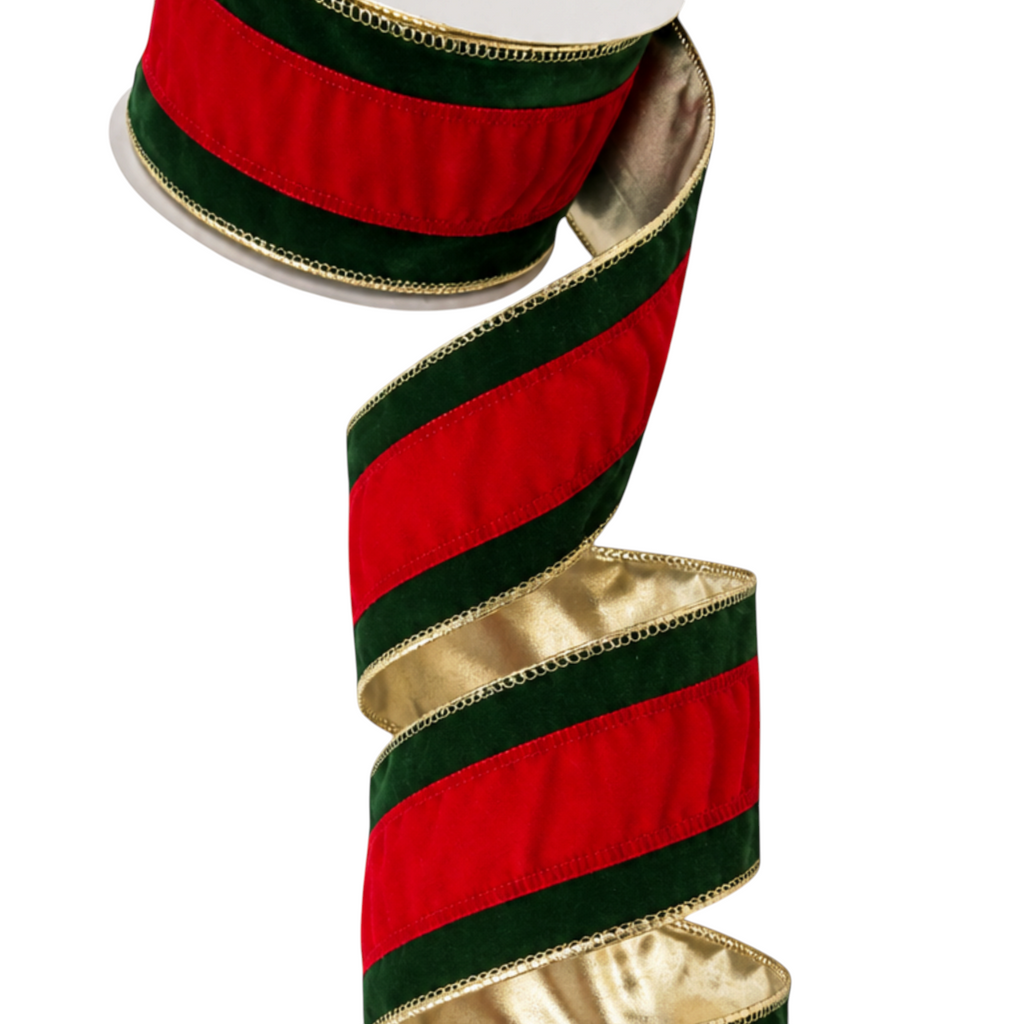 The Matthew John Collective green velvet and red stripe wired Christmas ribbon on a spool for holiday decorating.
