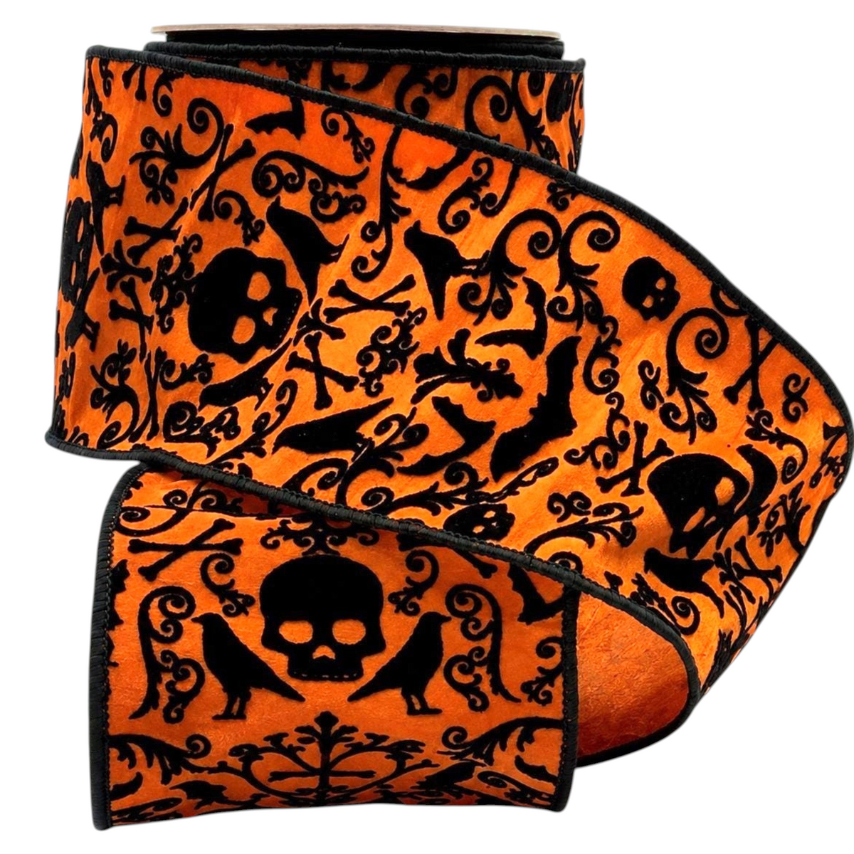 The Matthew John Collective orange dupioni ribbon with black flocked skulls, bats, and ravens for Halloween decor.
