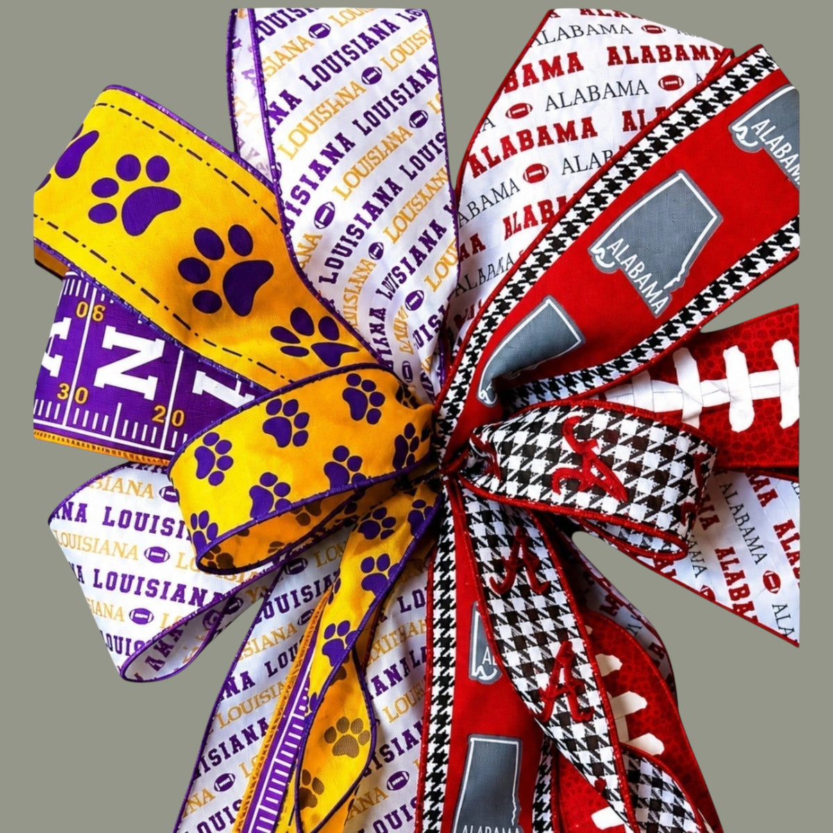 The Matthew John Collective House Divided Gameday Bow featuring LSU purple and gold and Alabama crimson and white ribbons