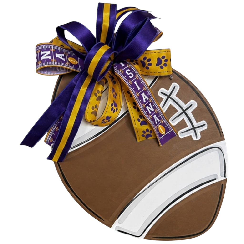 The Matthew John Collective LSU Tigers football door hanger with a purple and gold handmade designer bow
