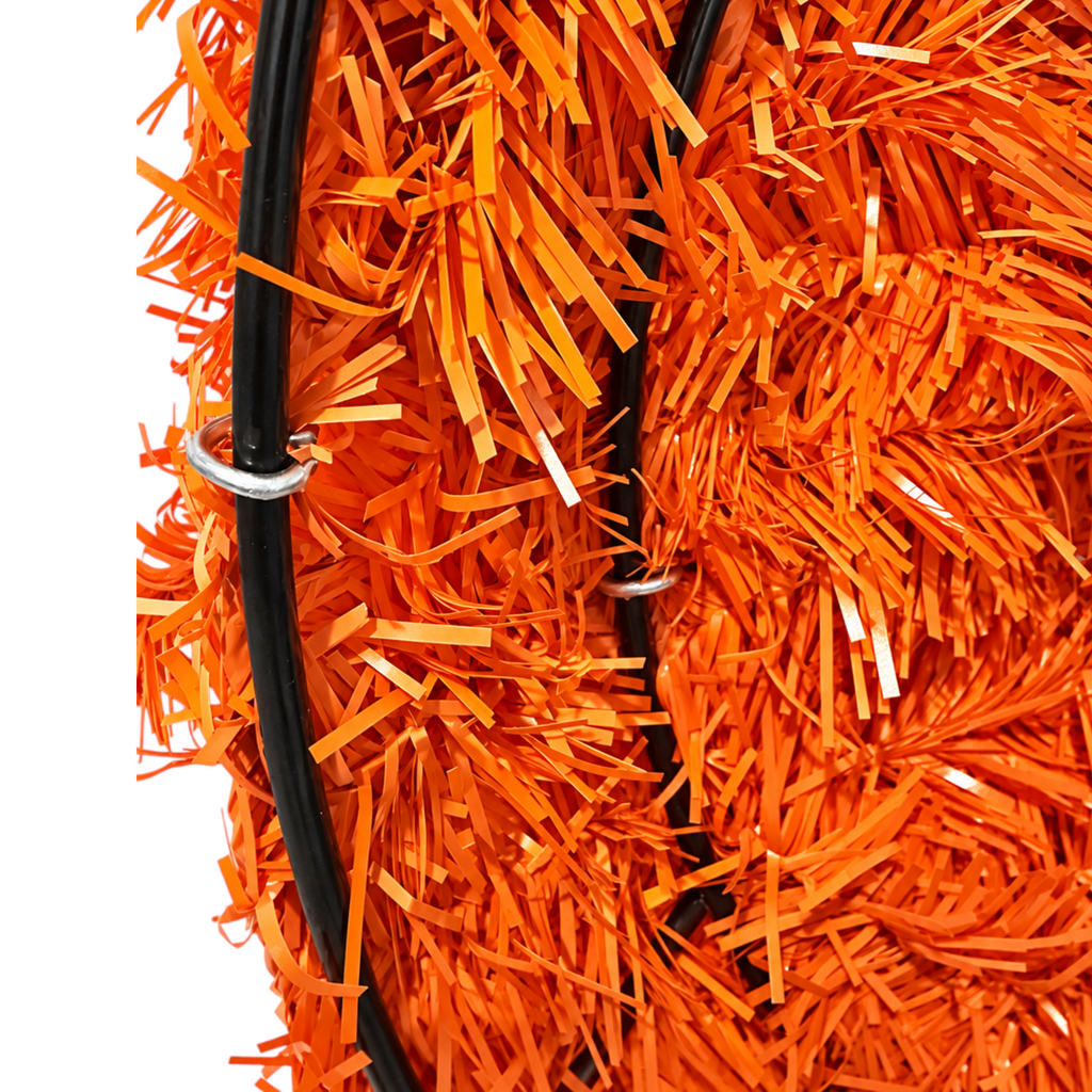The Matthew John Collective 24-inch vibrant orange artificial pine wreath featuring a sturdy black metal frame.