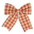The Matthew John Collective 15-inch orange and cream buffalo check puffy fabric bow for fall home decor.