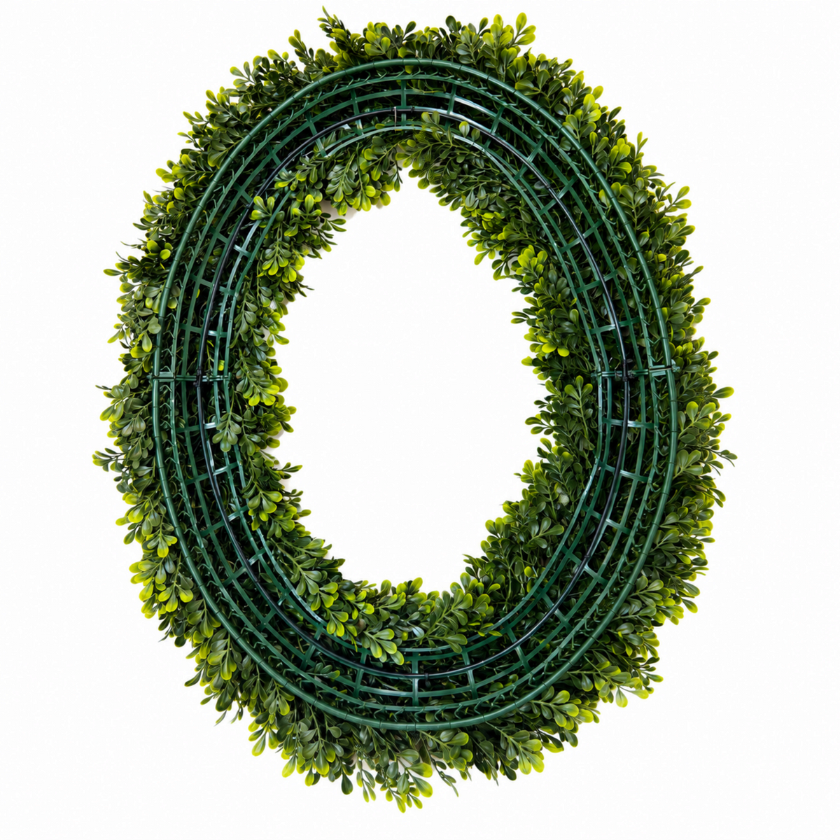 The Matthew John Collective oval artificial boxwood wreath with lush green foliage on a sturdy lattice frame.