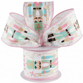 The Matthew John Collective pastel nutcracker wired ribbon with pink, mint, and blue soldiers on a white canvas roll.