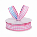 The Matthew John Collective pink and blue double-sided gingham wired canvas ribbon on a spool for spring crafts