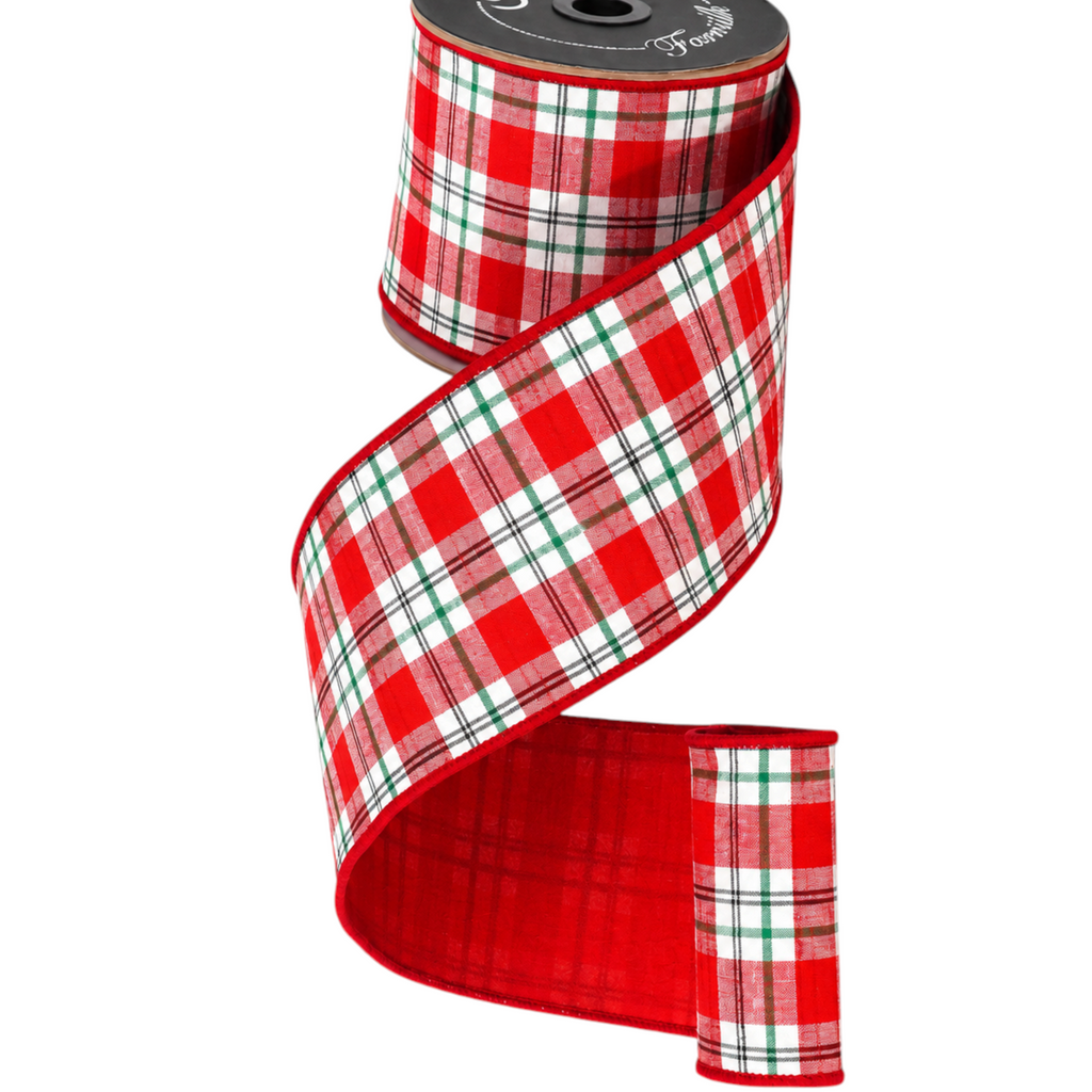 The Matthew John Collective Farrisilk 4-inch wide red, white, and black plaid designer Christmas ribbon on a roll.