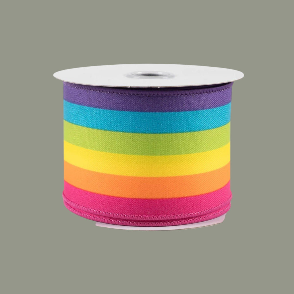The Matthew John Collective rainbow vertical stripe wired ribbon on a spool for crafts and gift wrapping