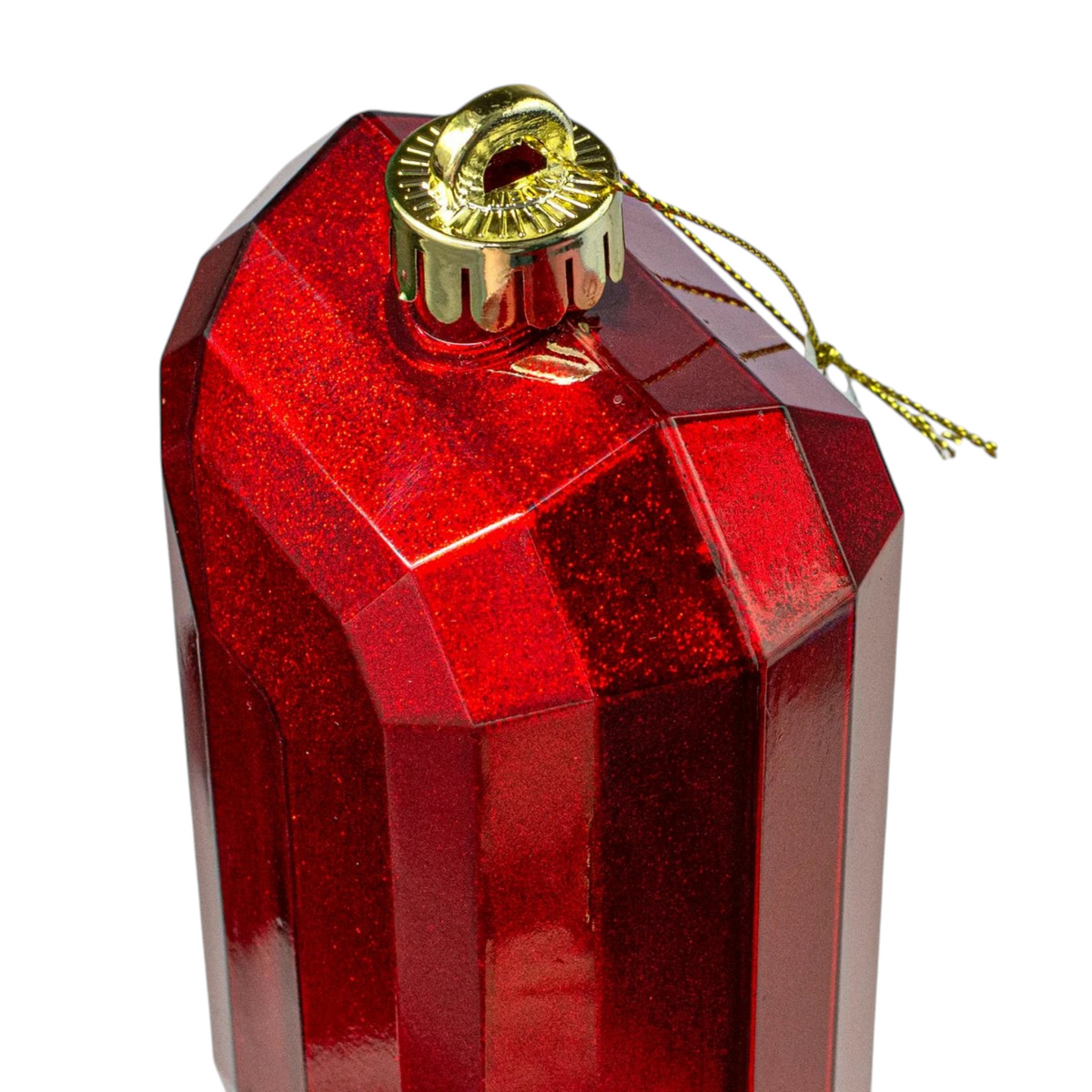 The Matthew John Collective red glitter rectangular gem ornament with faceted surfaces and a gold hanging loop.