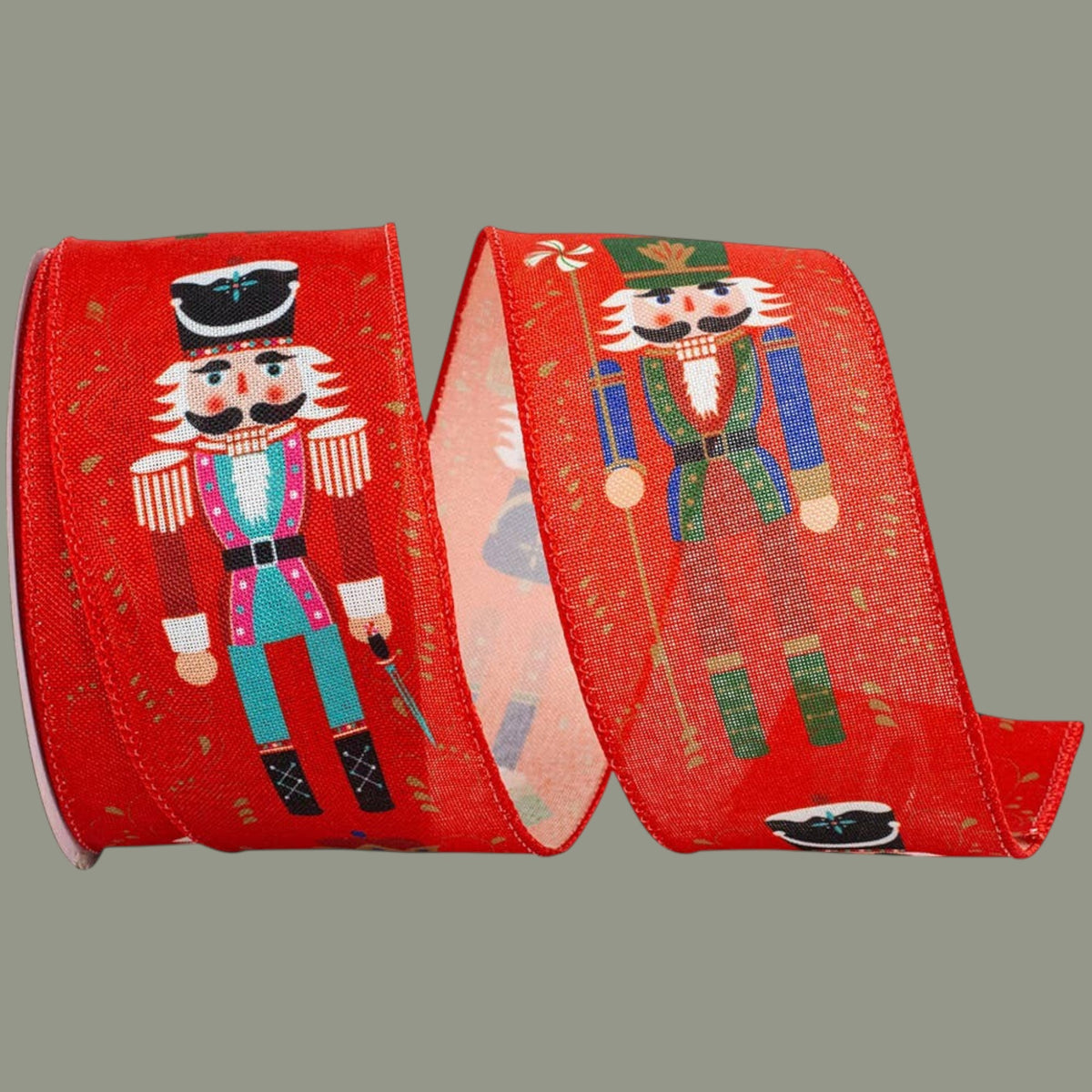 The Matthew John Collective red wired edge ribbon featuring whimsical nutcracker figures and intricate scrollwork