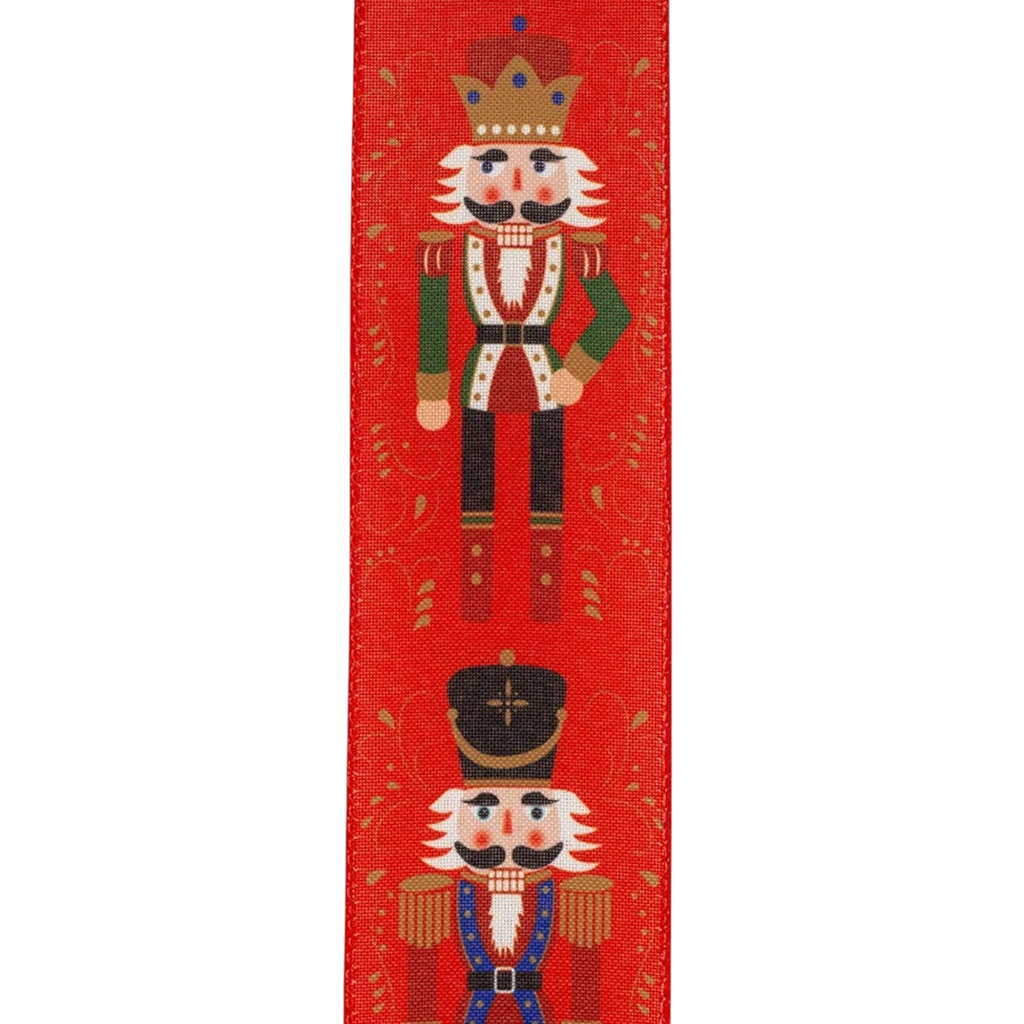 The Matthew John Collective red wired edge ribbon featuring whimsical nutcracker figures and gold scrollwork patterns.