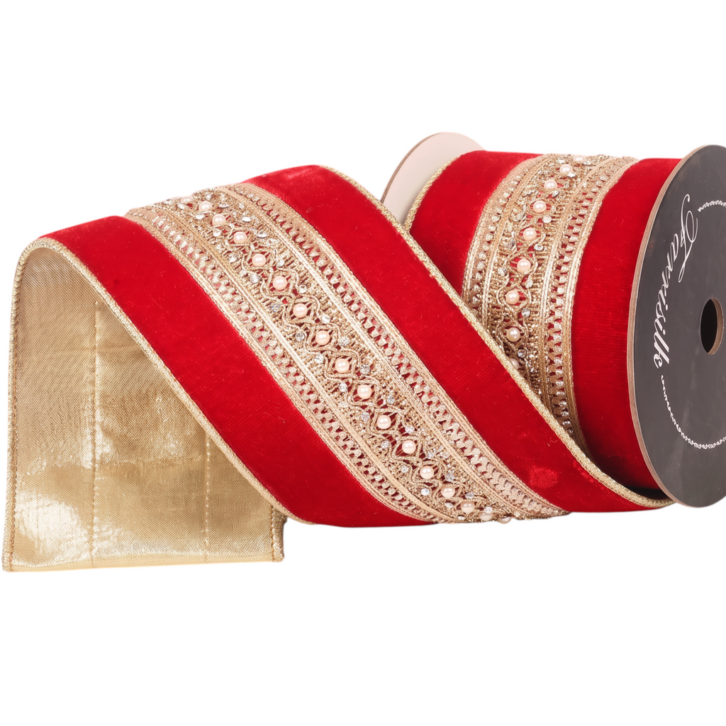 The Matthew John Collective Farrisilk red velvet holiday ribbon with gold beaded trim and wired edges on a spool.