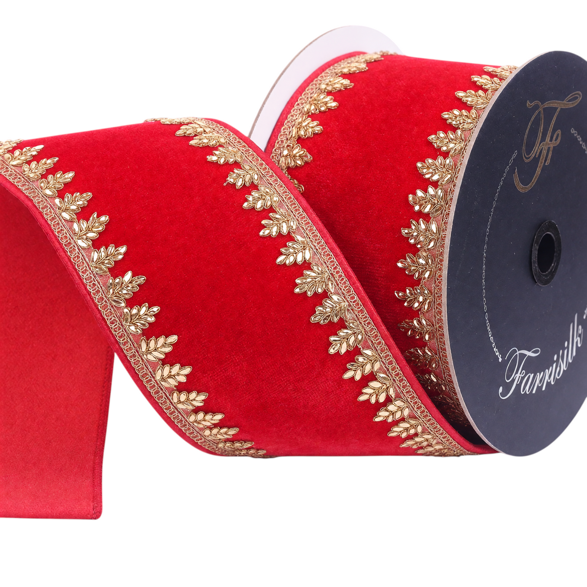 The Matthew John Collective Farrisilk Pinyon red velvet holiday ribbon with intricate gold leaf-inspired wired edges.