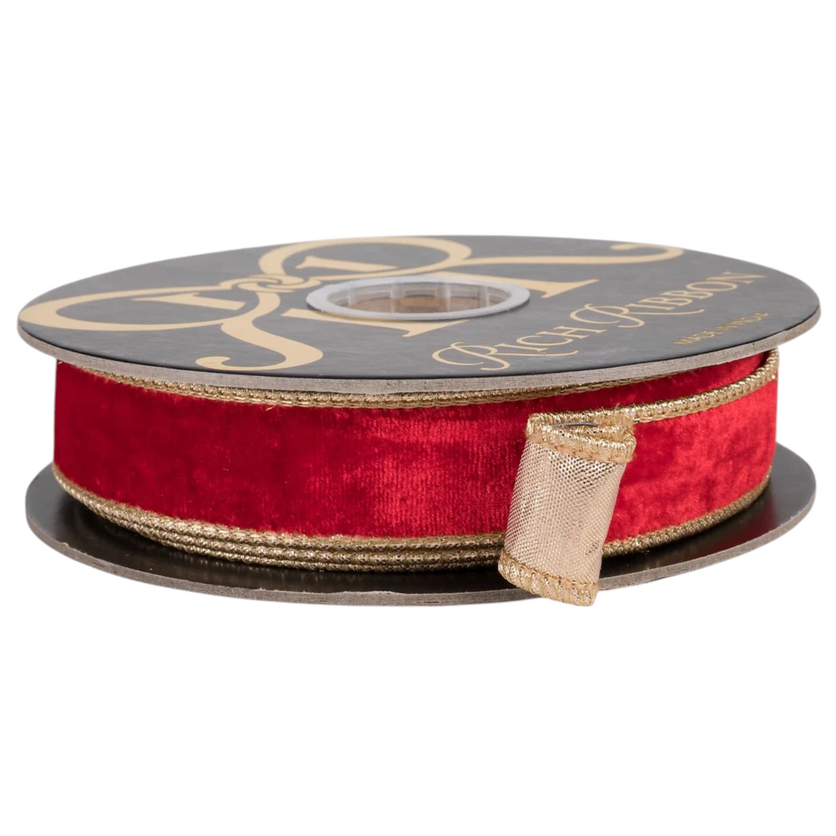 The Matthew John Collective 1-inch red velvet wired ribbon with gold metallic backing and corded stitched edges on a roll
