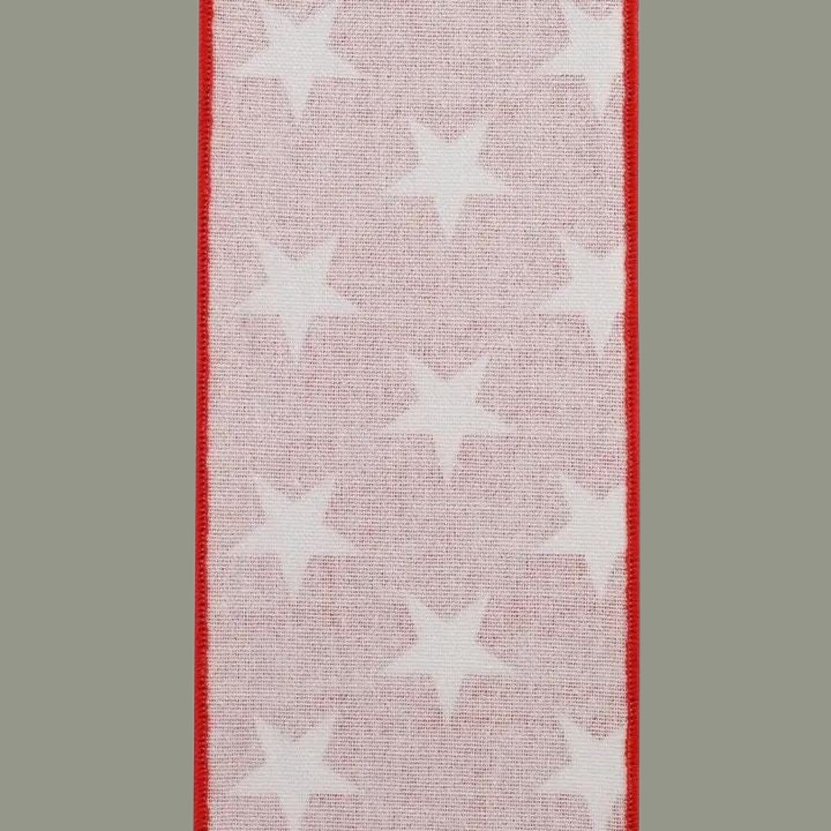 The Matthew John Collective red and white star print cotton canvas ribbon with a wired edge for patriotic decor.