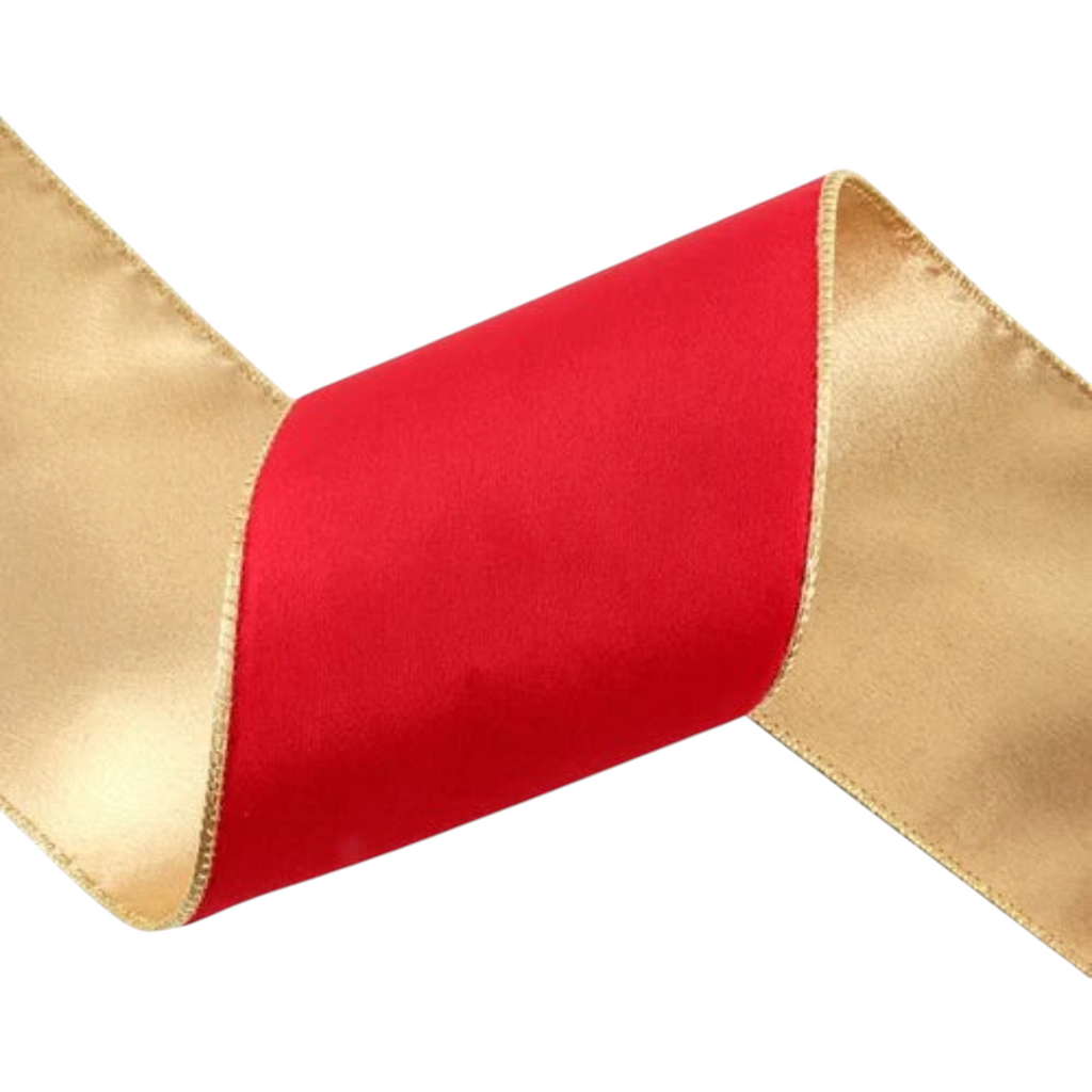 The Matthew John Collective reversible wired ribbon in rosy red velvet with a metallic gold backing for holiday decor.
