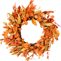 The Matthew John Collective 21-inch round fall garden wreath with lush orange, gold, and brown autumn foliage.