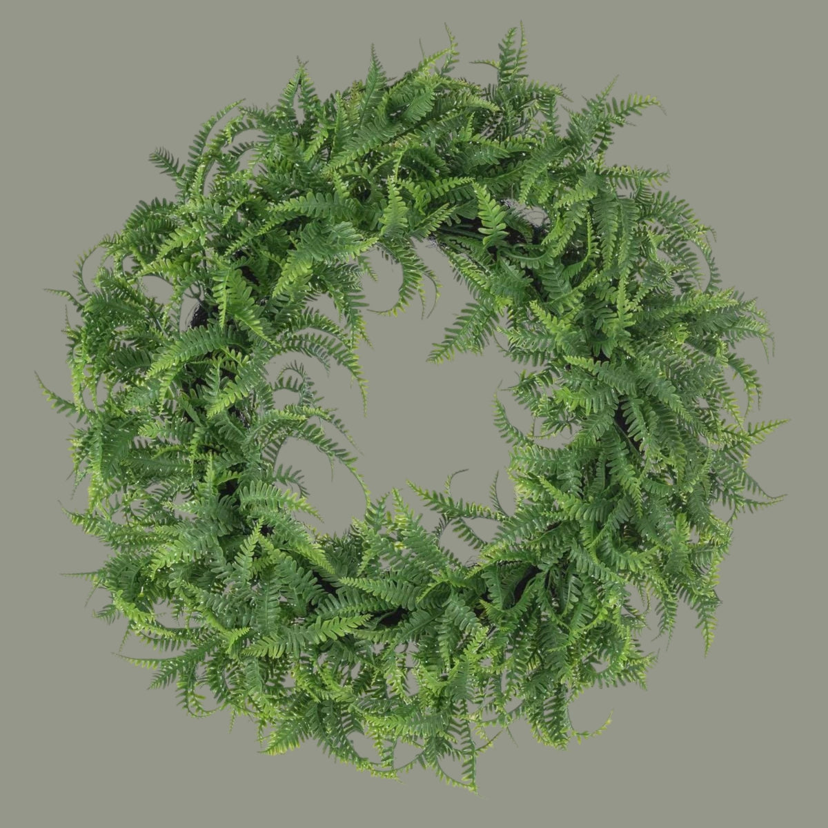 The Matthew John Collective 18-inch round fern wreath with two-tone green plastic fronds on an angel vine frame.