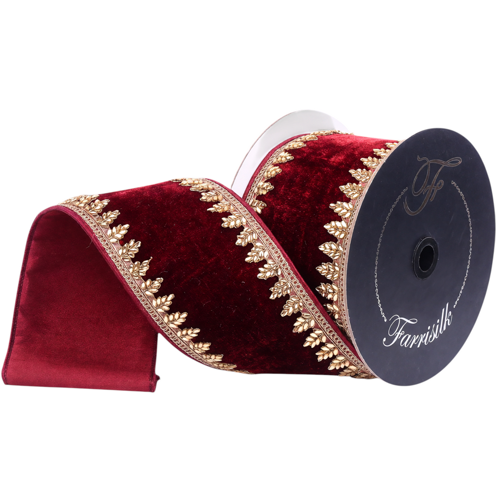 The Matthew John Collective Farrisilk ruby red velvet holiday ribbon with gold metallic leaf trim and wired edges.