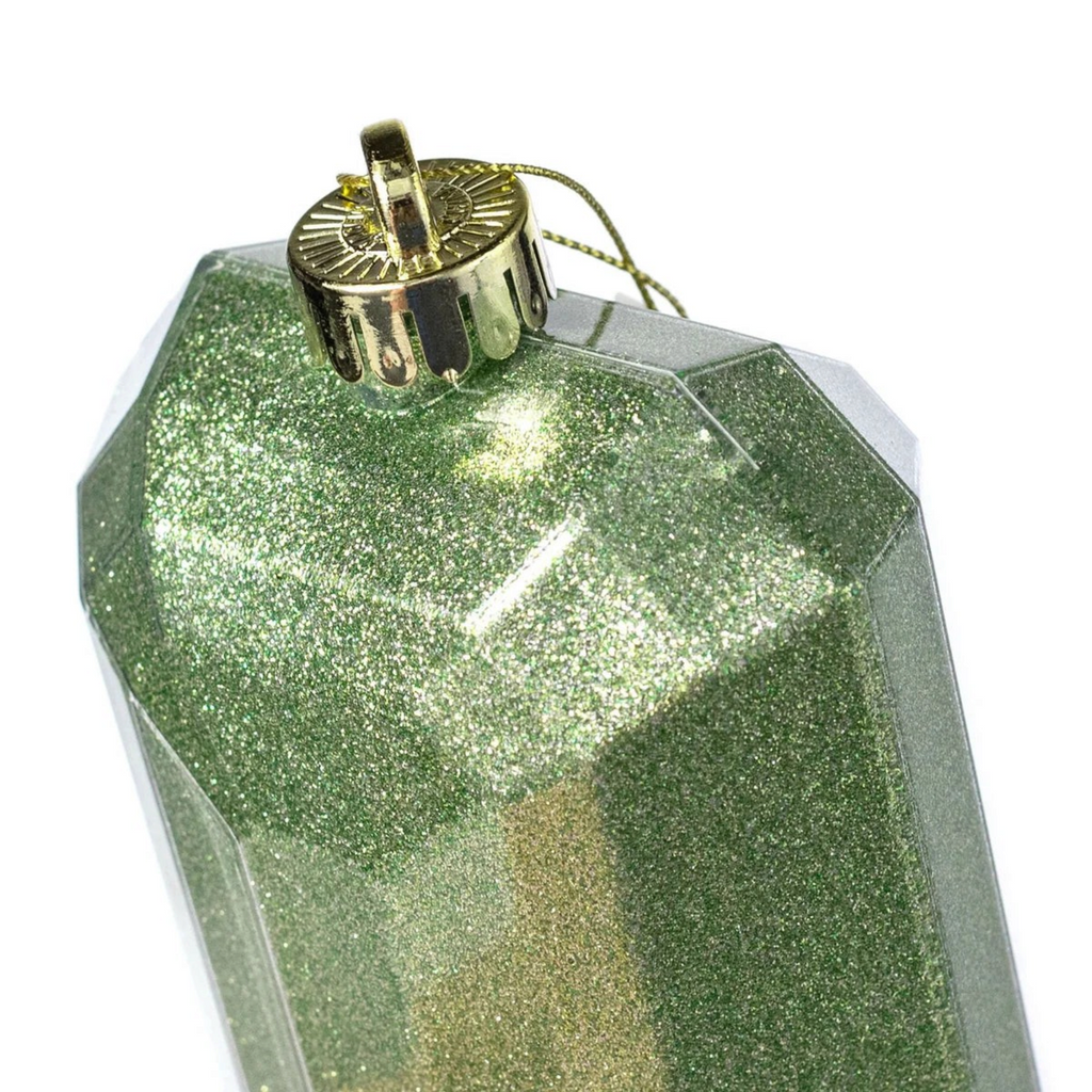 The Matthew John Collective sage green glitter gem ornament with a faceted rectangular design and gold hanging loop.