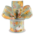 The Matthew John Collective sage green wired ribbon featuring orange pumpkins, sunflowers, and fall foliage patterns.