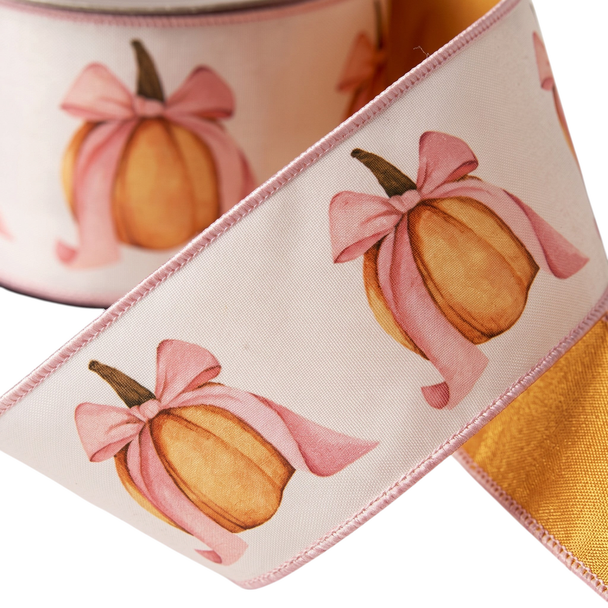 The Matthew John Collective satin ribbon featuring orange pumpkins with pink bows on a cream background