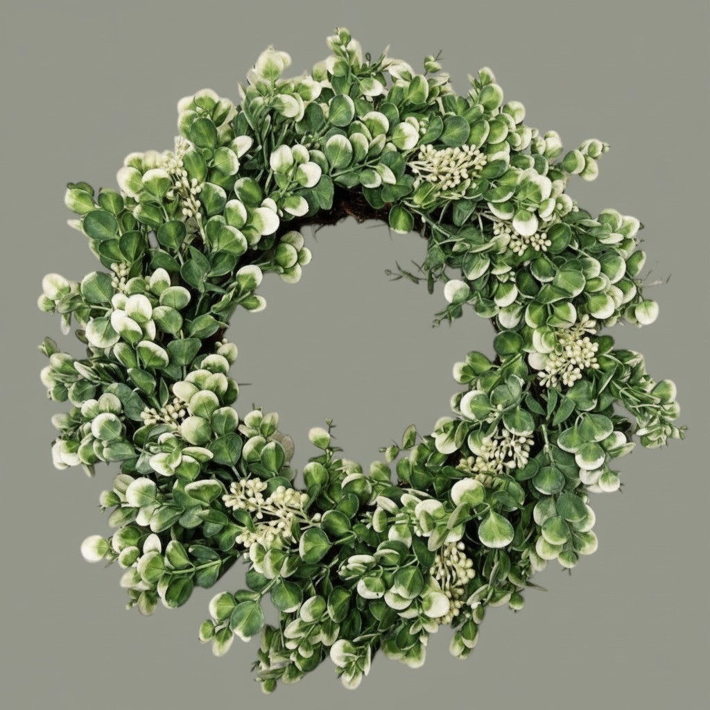 The Matthew John Collective 20-inch seeded eucalyptus wreath with white accent florals on a natural twig base.