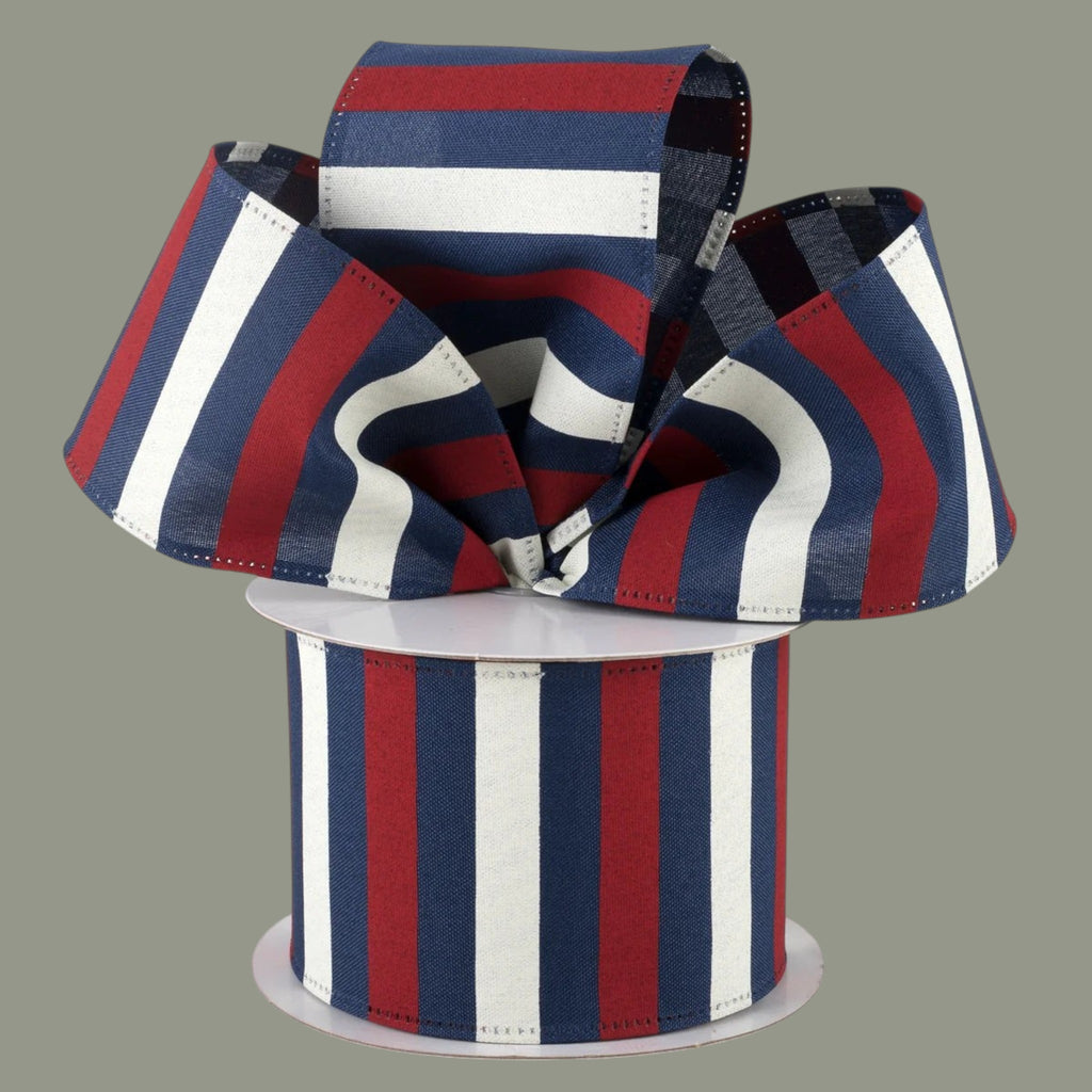 The Matthew John Collective 2.5 inch wired satin ribbon featuring red, ivory, and navy blue horizontal stripes.