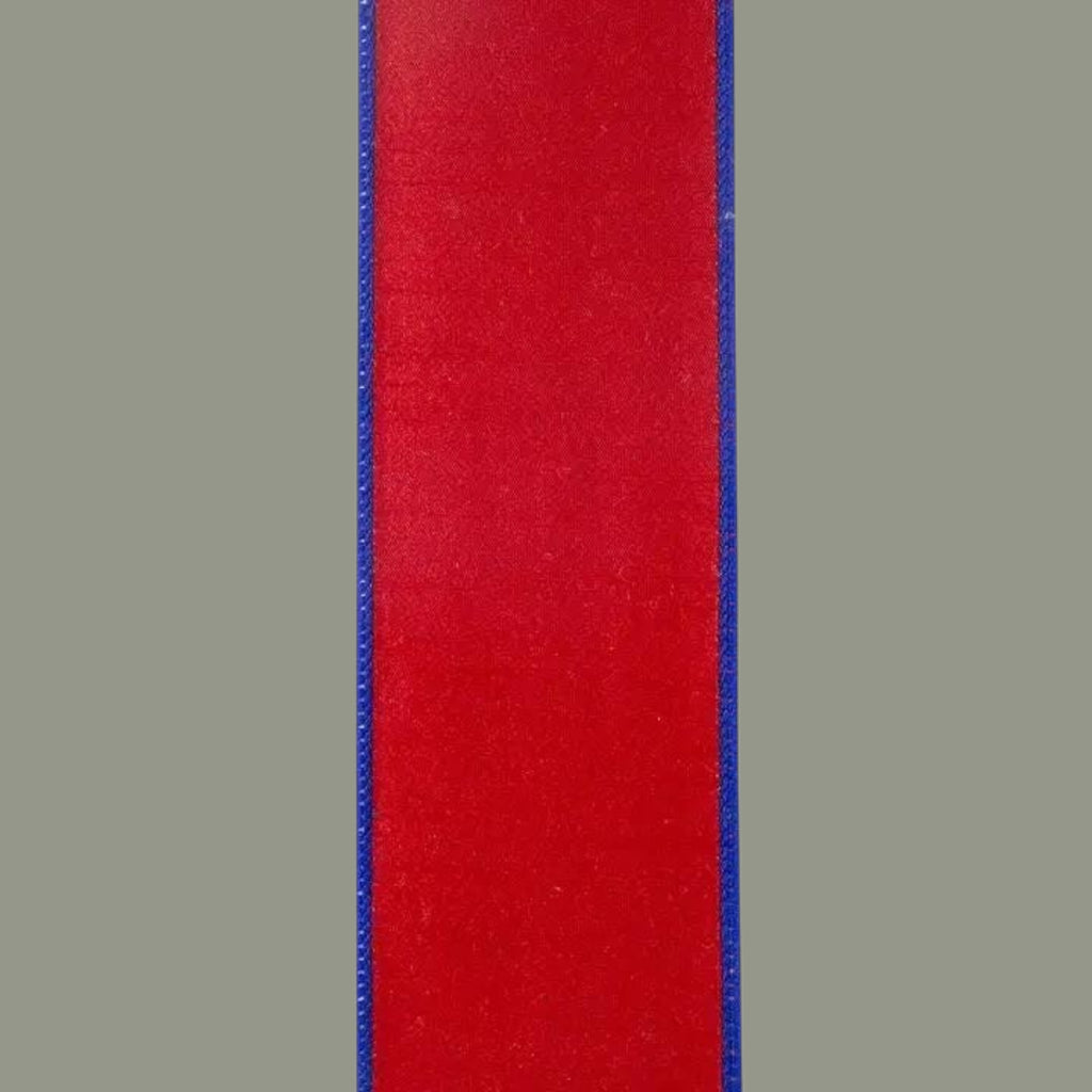 The Matthew John Collective red and blue striped twill dupioni wired ribbon for patriotic craft and decor projects.