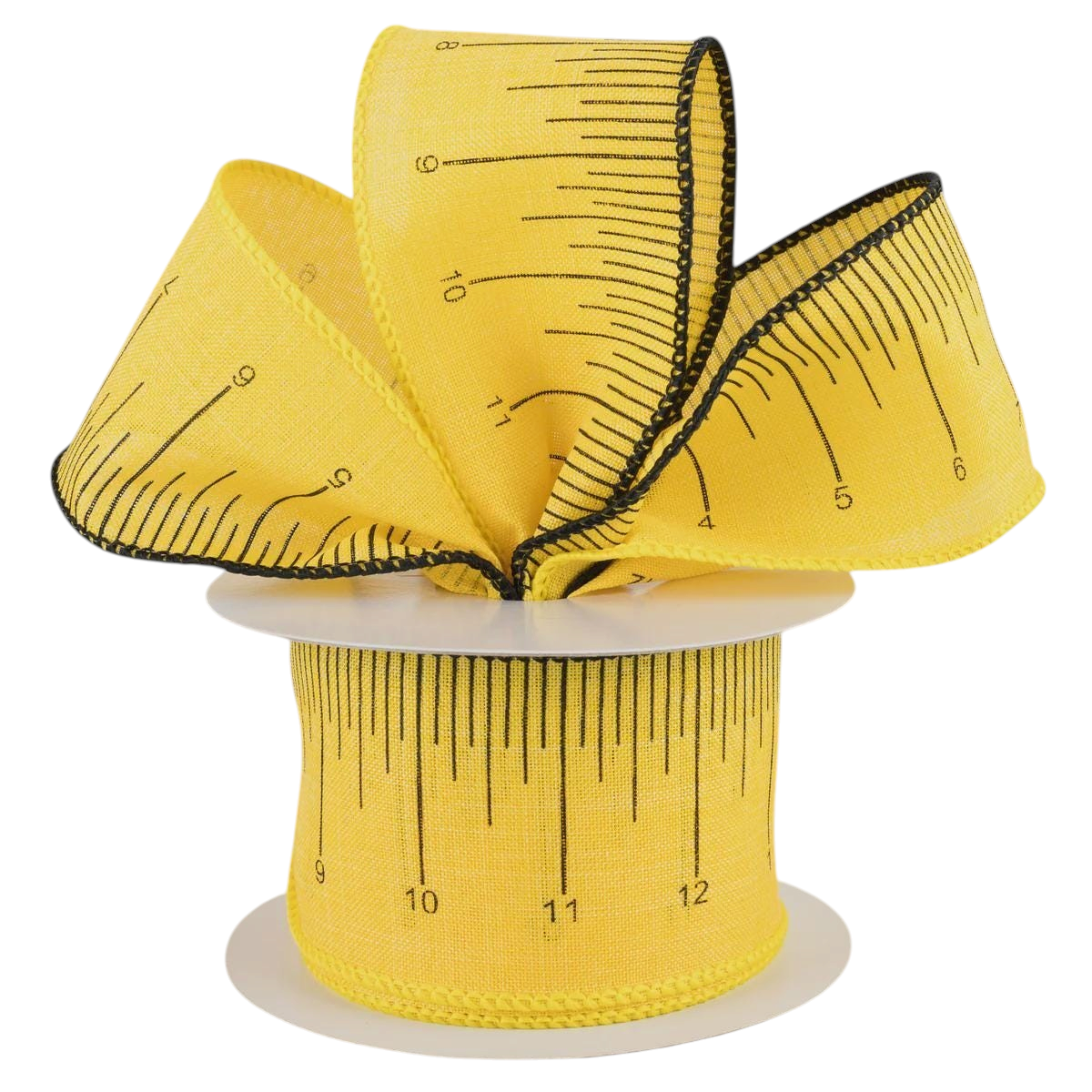 The Matthew John Collective yellow canvas ribbon with black ruler hash marks and wired edges on a spool